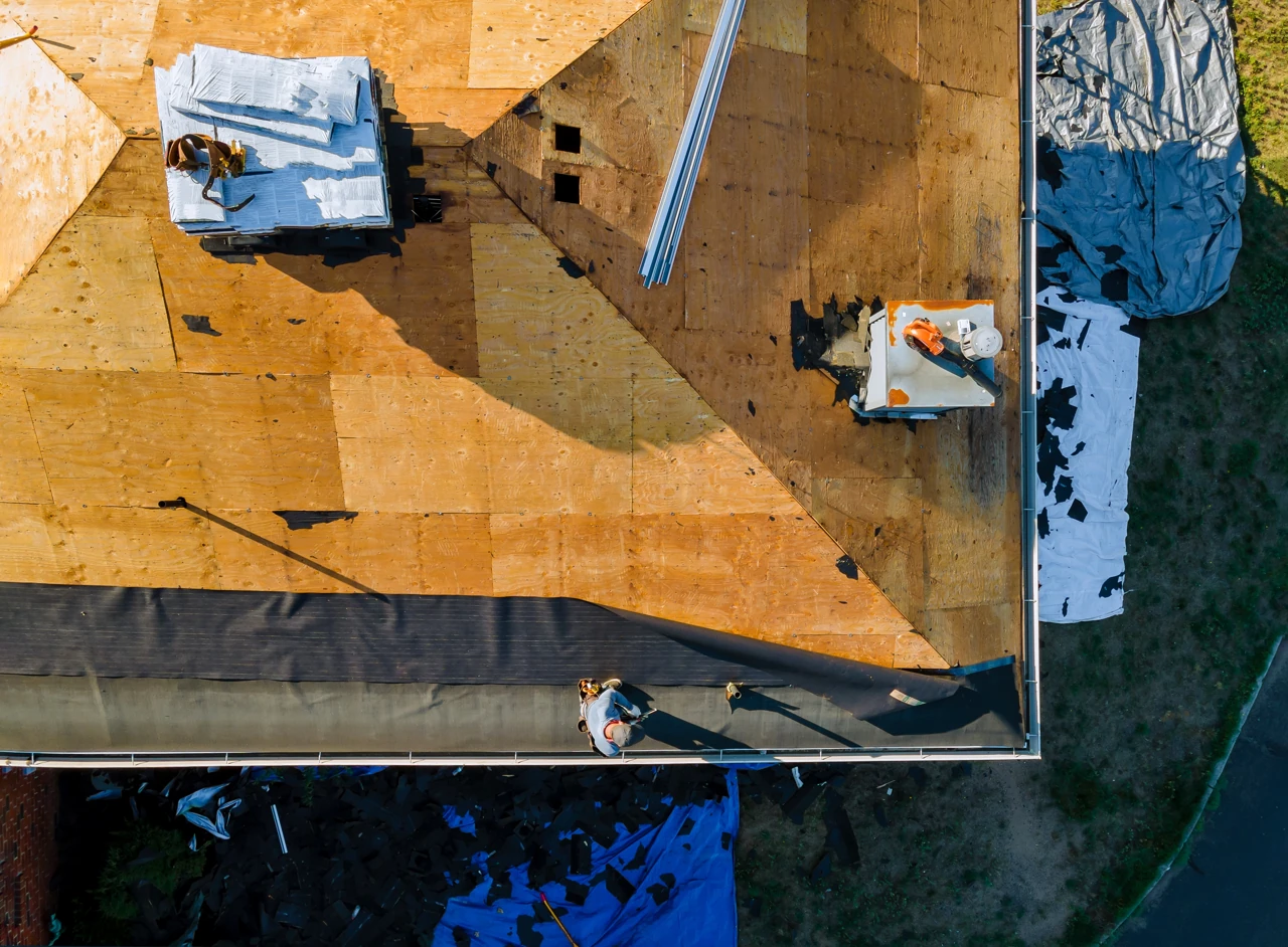 Roofer working on a residential roof