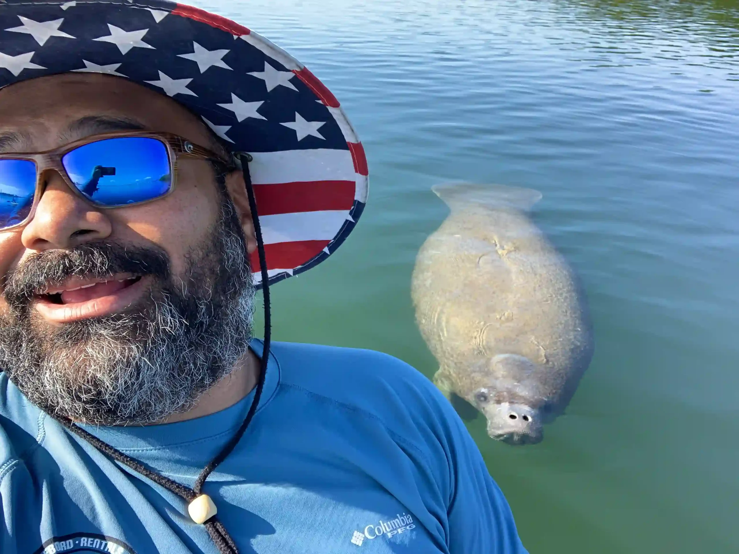 Family enjoying a tandem kayak trip together